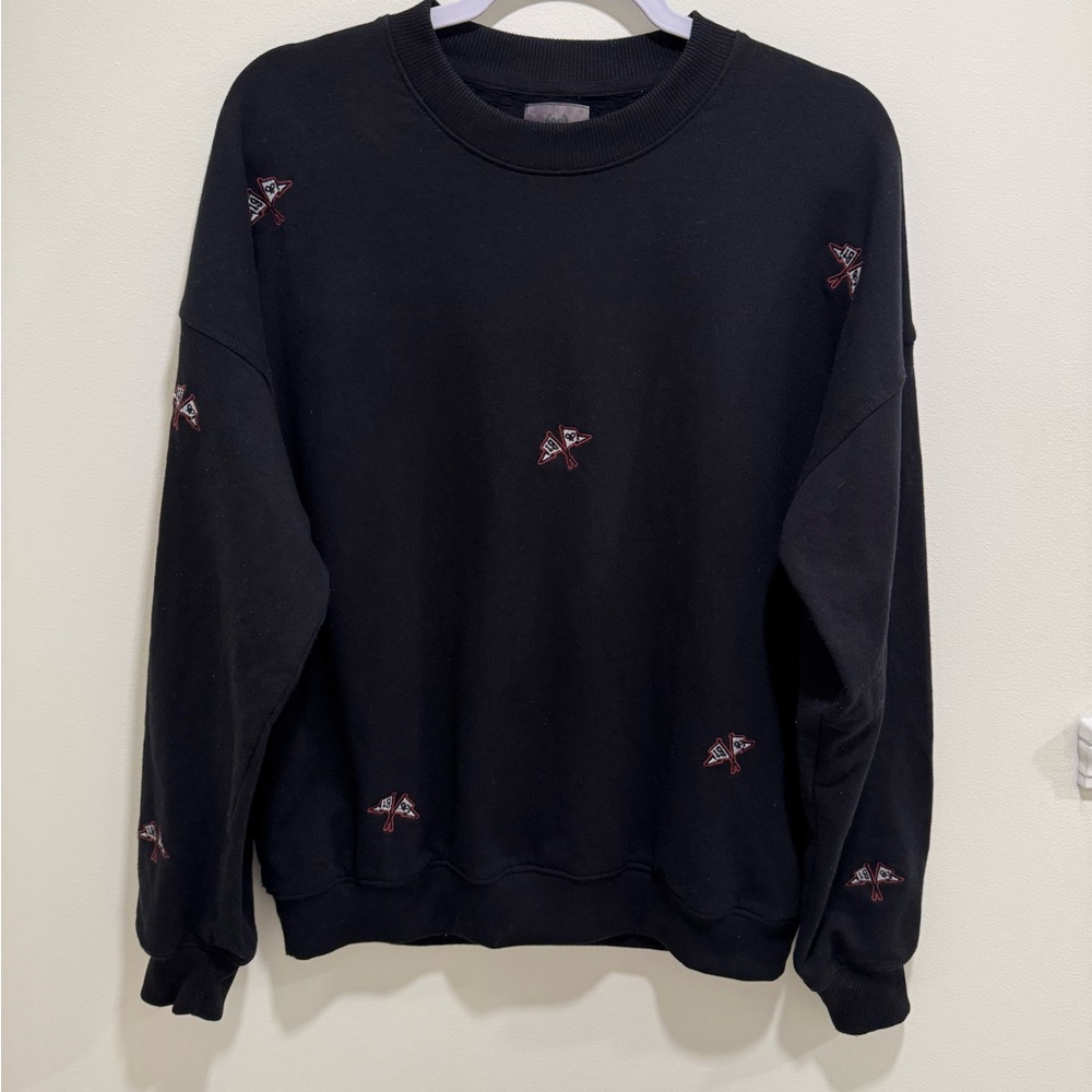 Stylish Black Crewneck Sweater with Embroidered Details